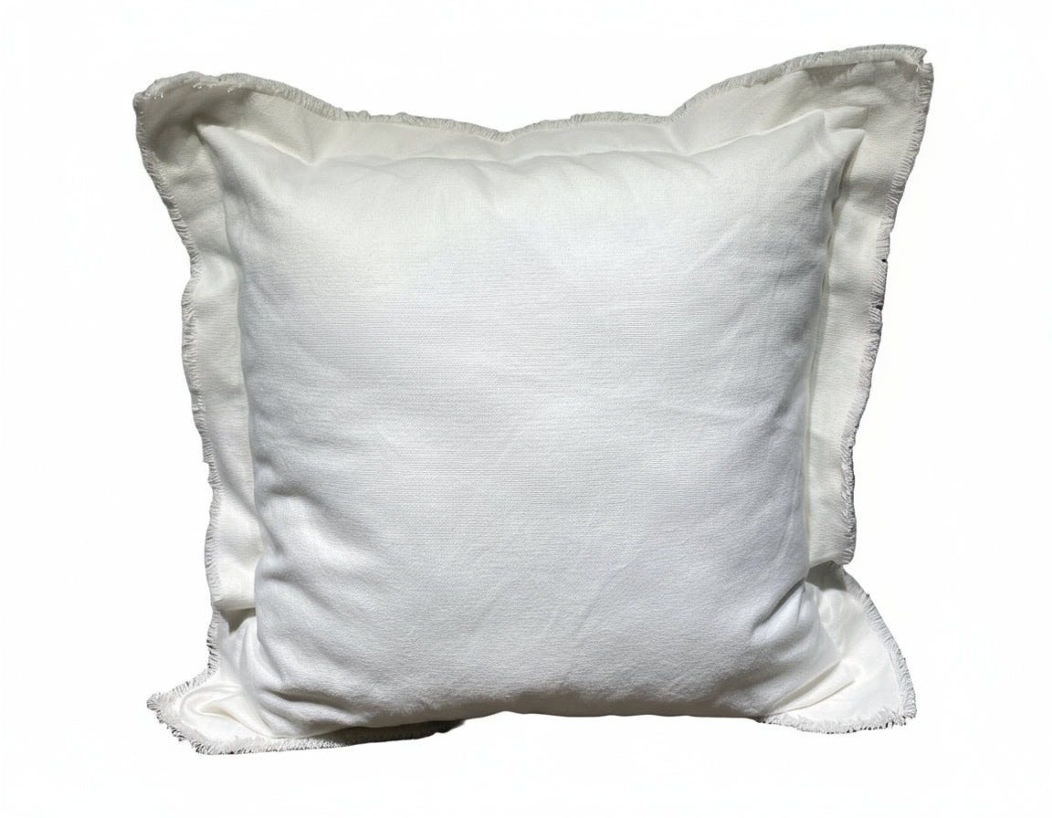 Cojín blanco desflecado